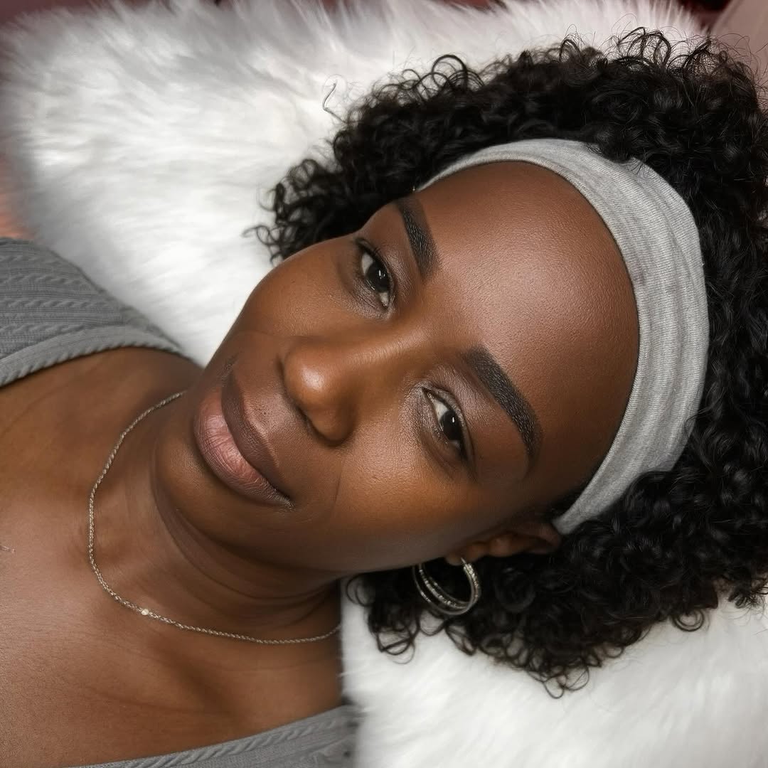 Brows photographed at a yearly touch-up, shape and pigment both adjusted from the original set