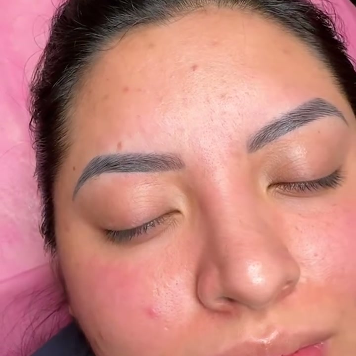 Healed brows almost four years after the last touch-up, pigment faded to a soft cool taupe with the original shape still holding